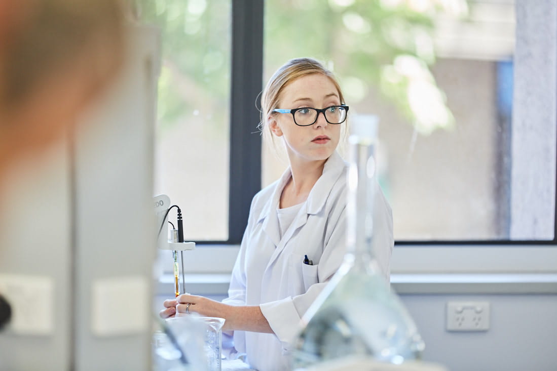 Sequiris female researcher in a laboratory